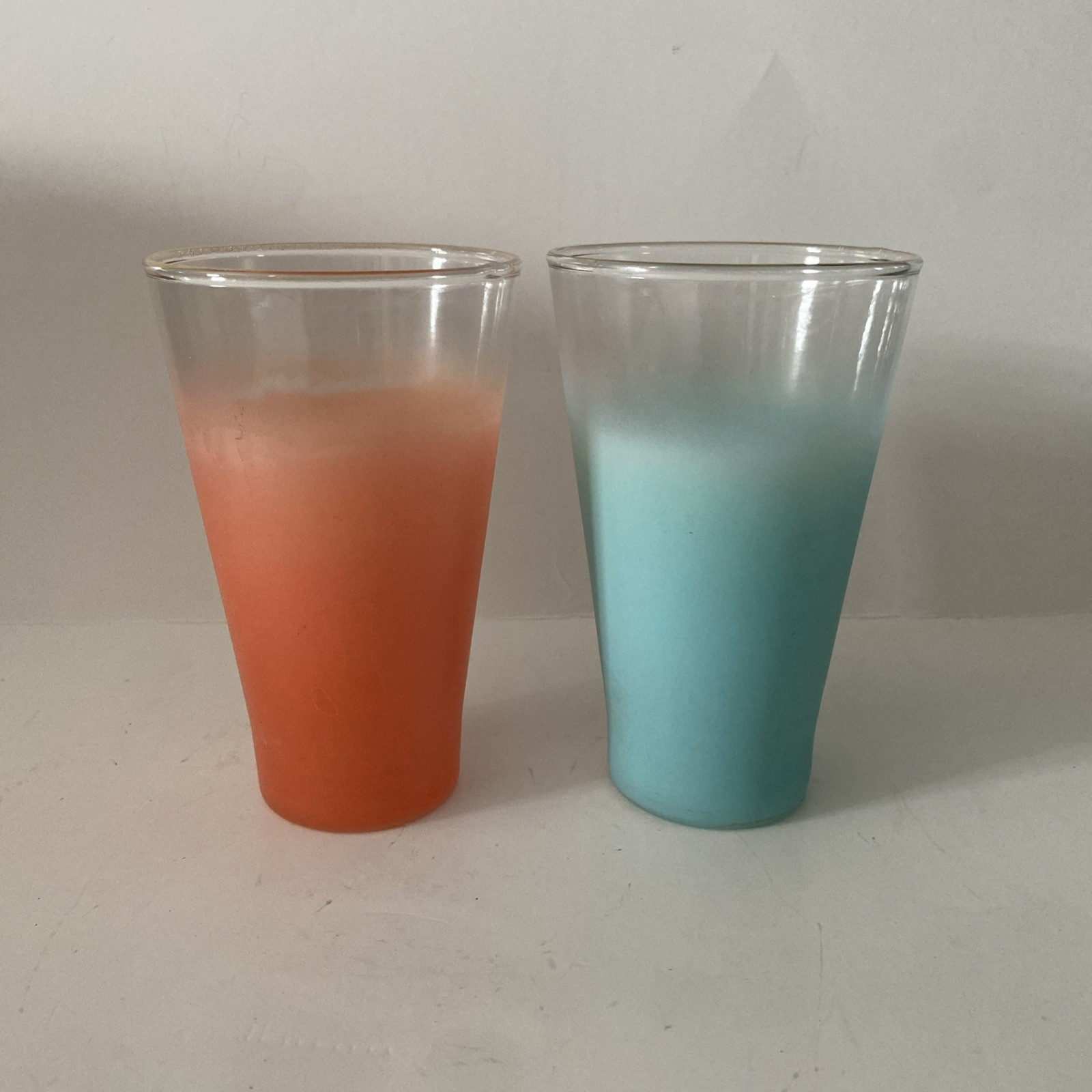 Vintage MCM Blendo frosted tapered tumblers with gold rims.