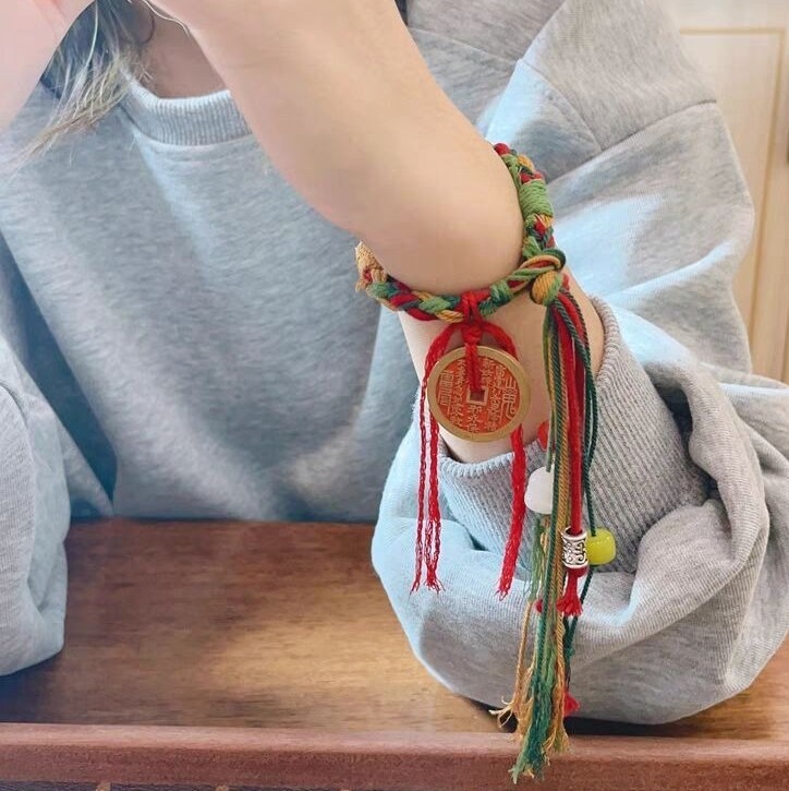 Tibetan Cinnabar Mountain Ghost Coin Bracelet Handmade Woven Cord Tassel