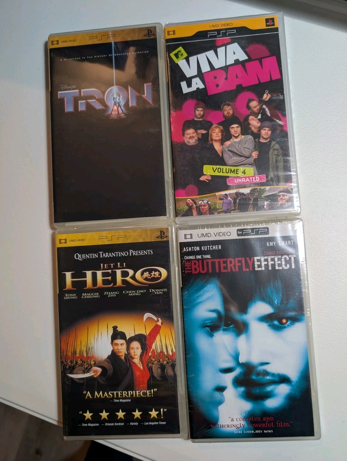 Sealed PSP UMD Movie Bundle - 4 Titles: Viva La Bam, Tron, Hero, ButterflyEffect