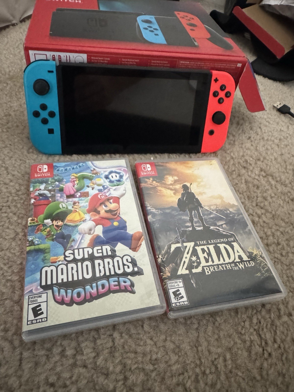 Nintendo Switch Console w/ Super Mario Bros. Wonder, Zelda, Accessories