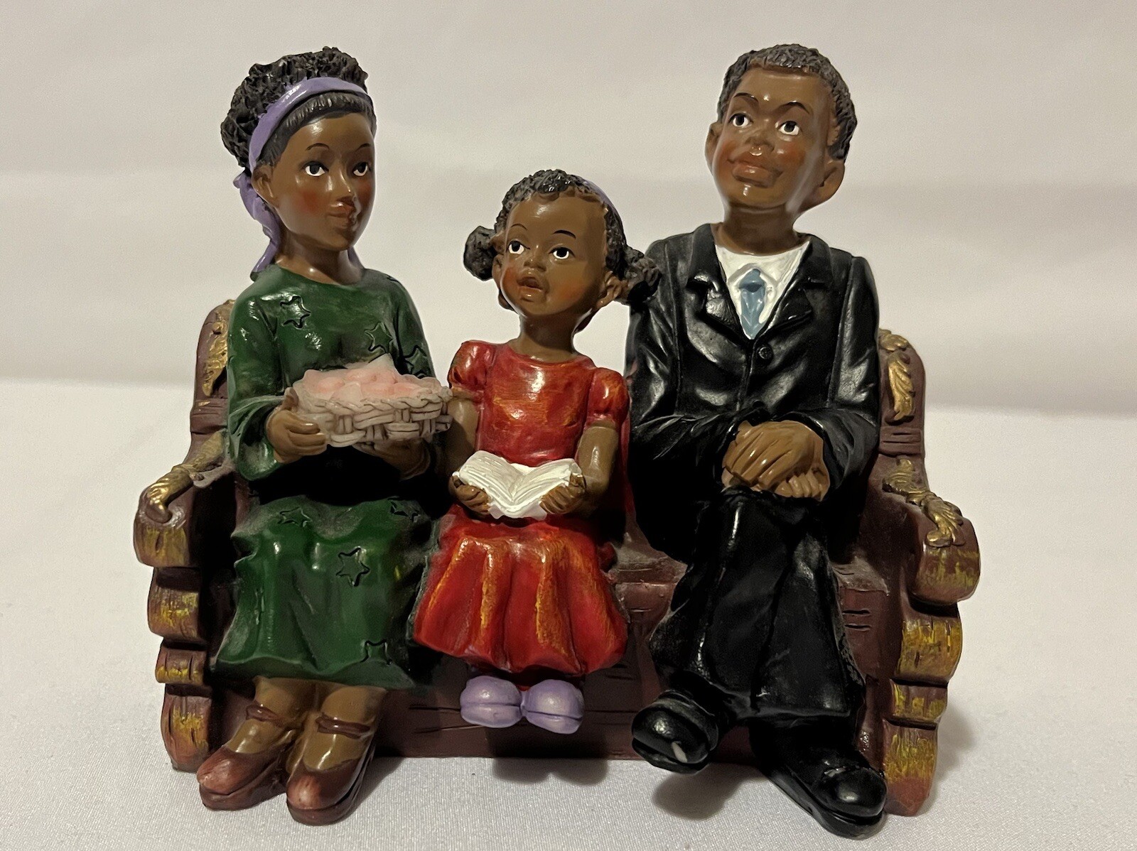 UTI The Church Collection African American Family Of 3 sitting on a Church Pew