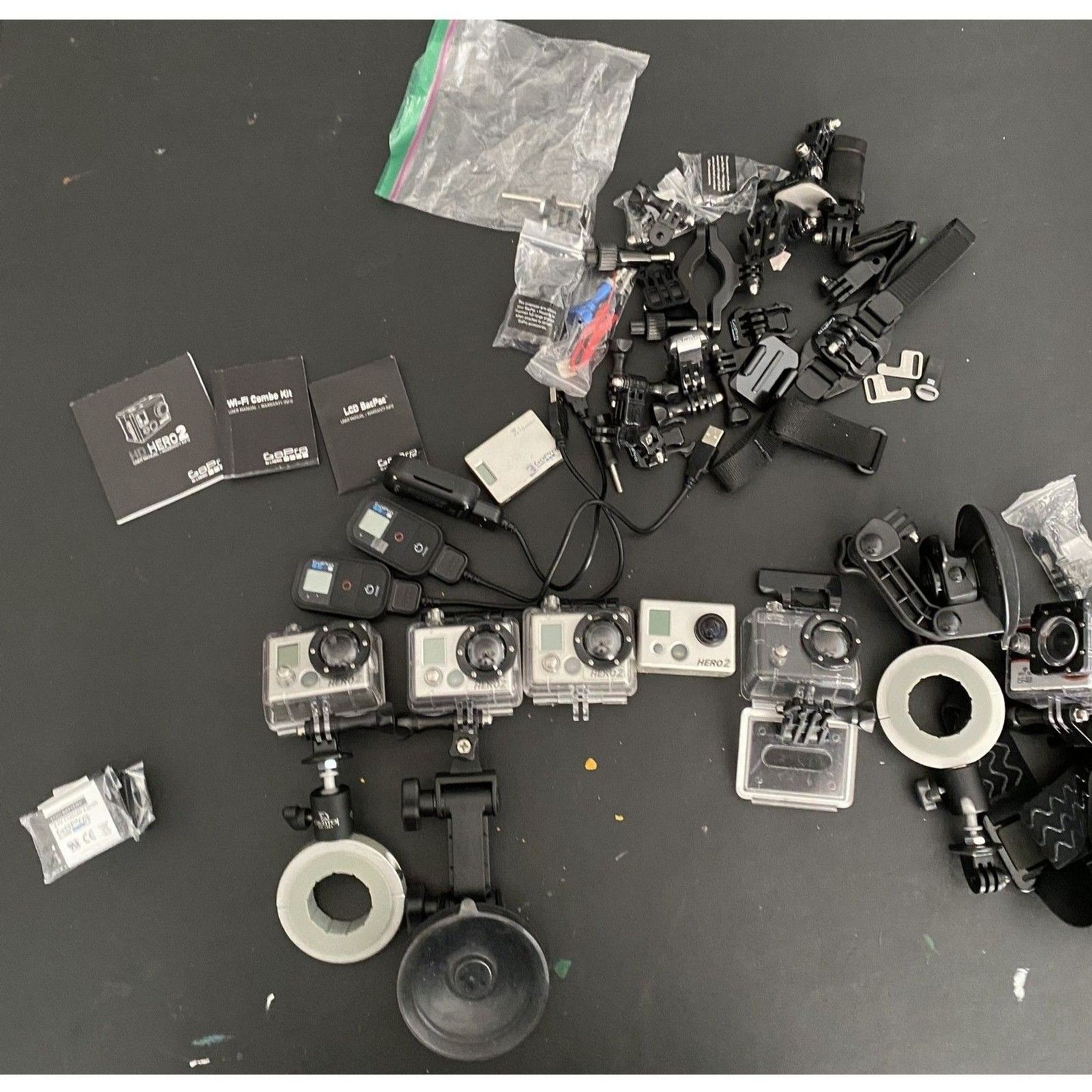 4 GoPro Hero2 Cameras 1Explore One 3 GoPro wifi remotes Go Pro Backpack and more