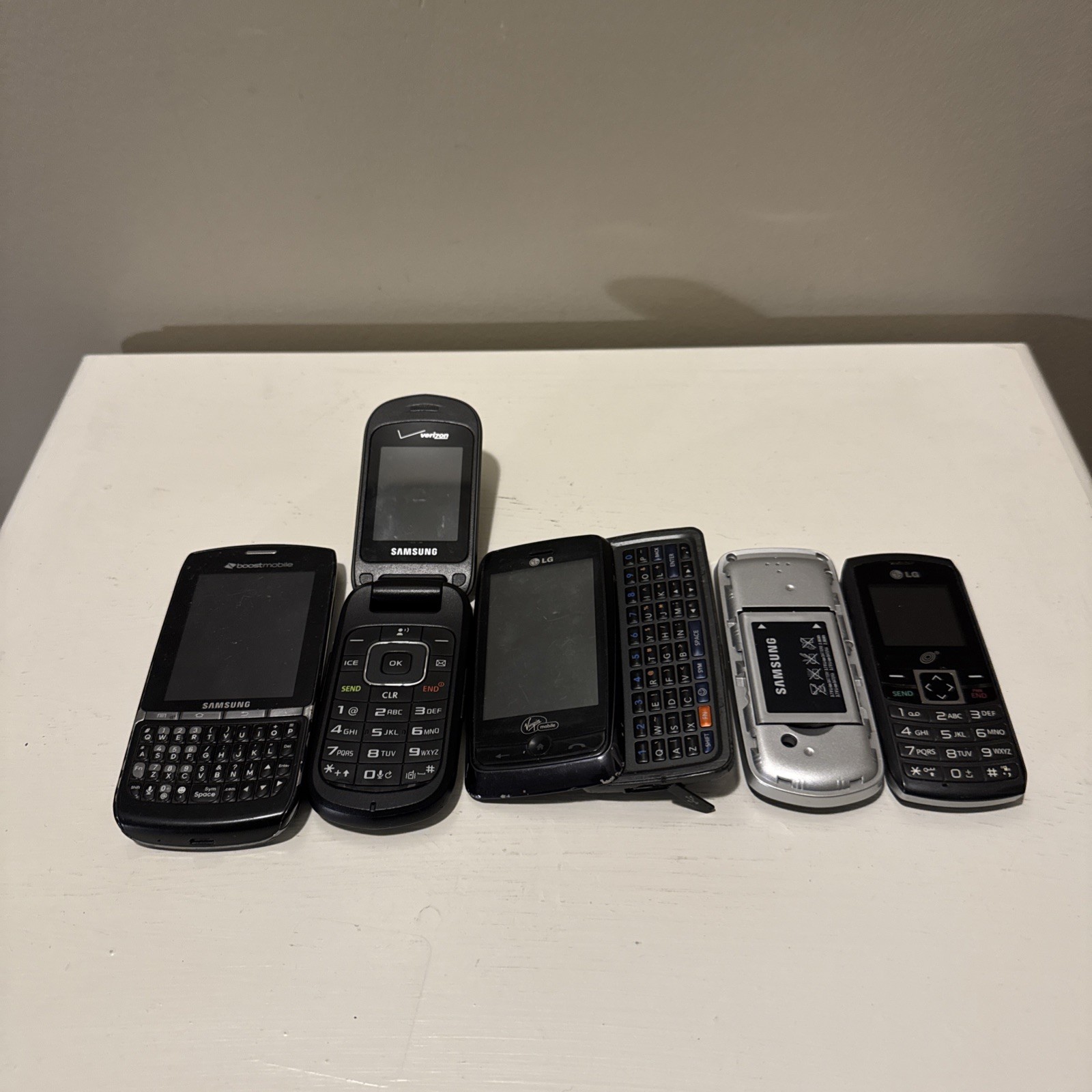 Lot of 5Cellphone Flip Phone untested for parts or repair Verizon Samsung LG etc