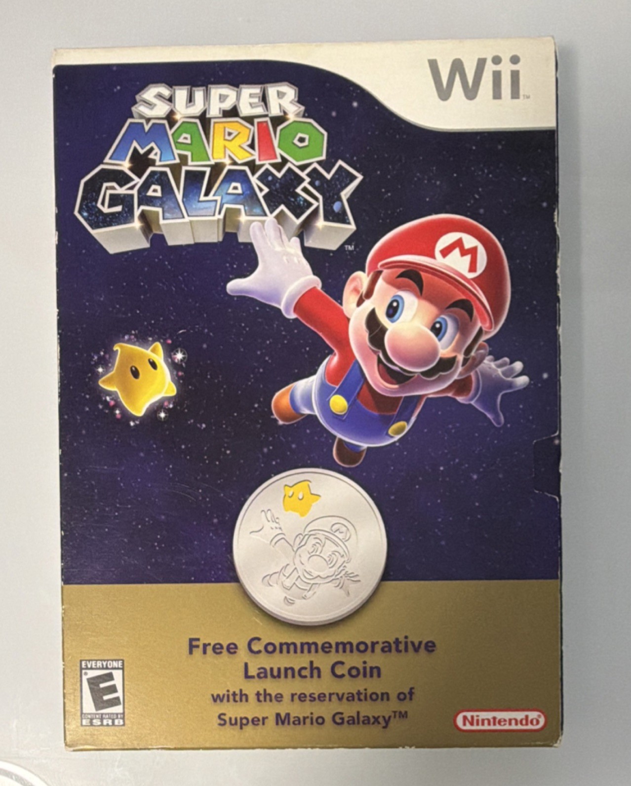 Nintendo Super Mario Galaxy Wii Commemorative Launch Coin Certificate