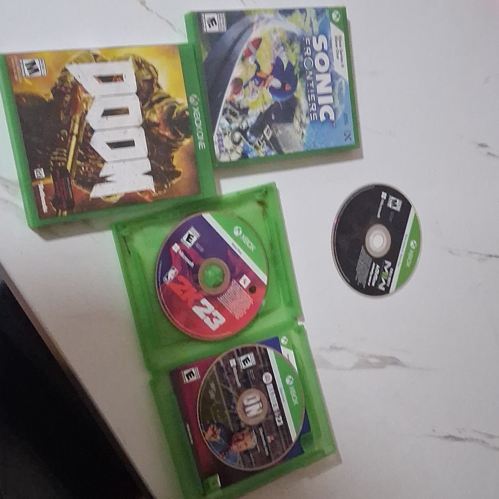 Xbox Game Lot: Doom, Sonic Frontiers, NBA 2K23, Madden NFL 21 with Cases