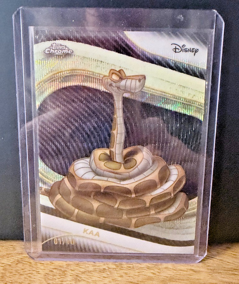 2025 Topps Chrome Disney Kaa #109 Black Wave 1/10 First on Print Jungle Book