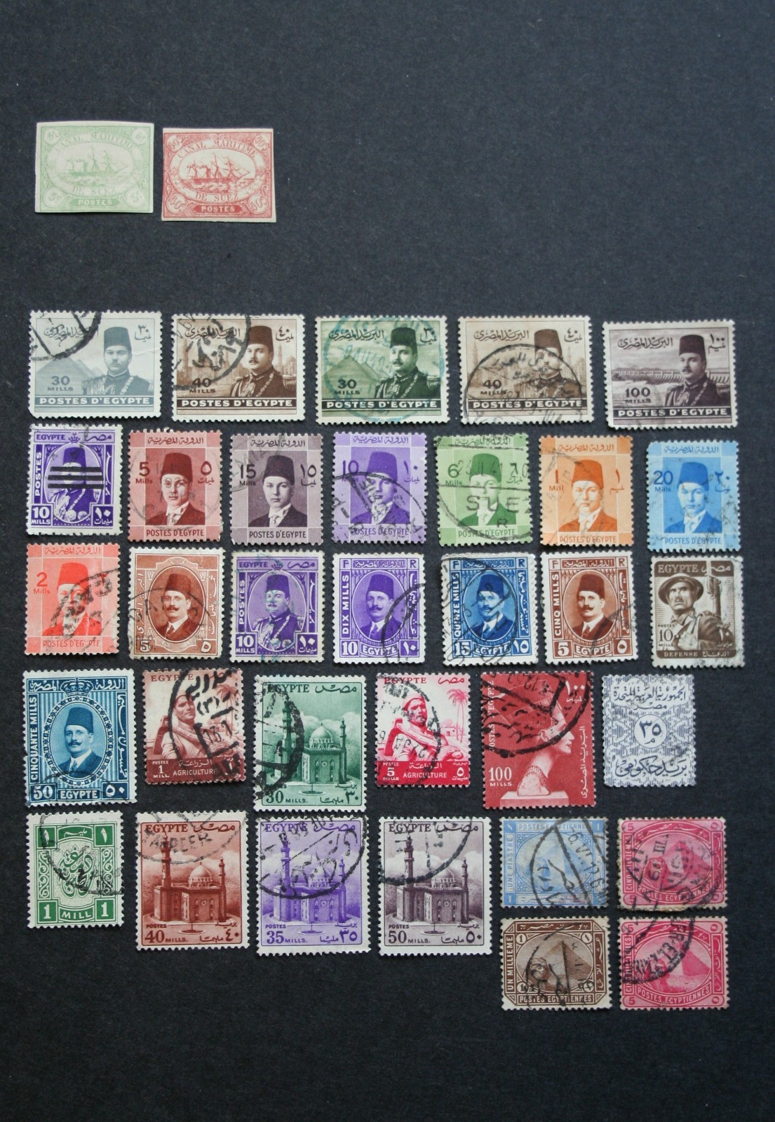 Two (2) MNH stamps and thirty-three (33) used stamps from Egypt, circa 1930s-40s