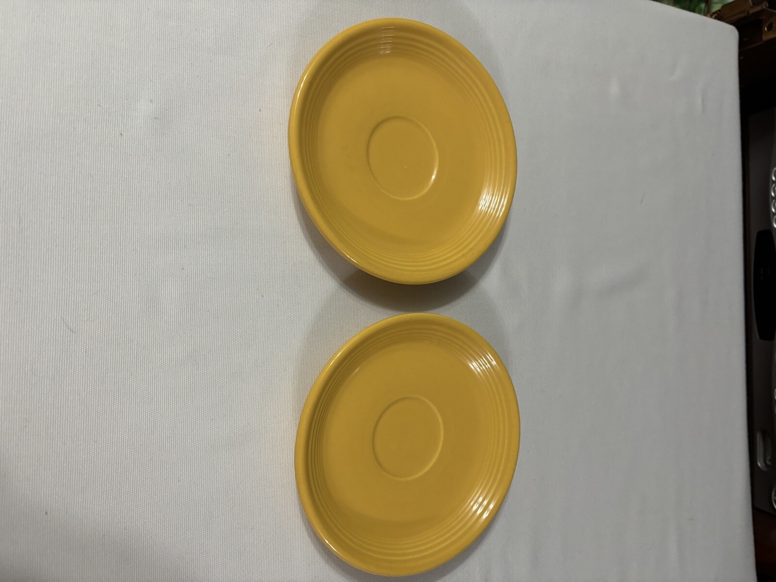 Homer Laughlin HLC Fiesta Ware  Saucers gold-  lot of 2 saucers