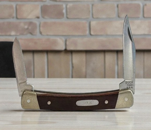 Vintage 1987 Buck 709 Yearling Wood Grain Folding Pocket Knife Made in the USA