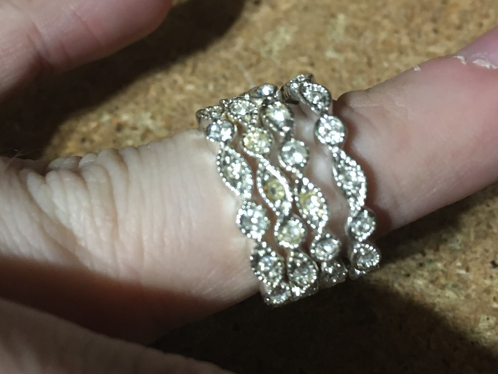 AVON SET OF FOUR STACKABLE RHINESTONE BAND RING SIZE 8 / WRONGWAY052