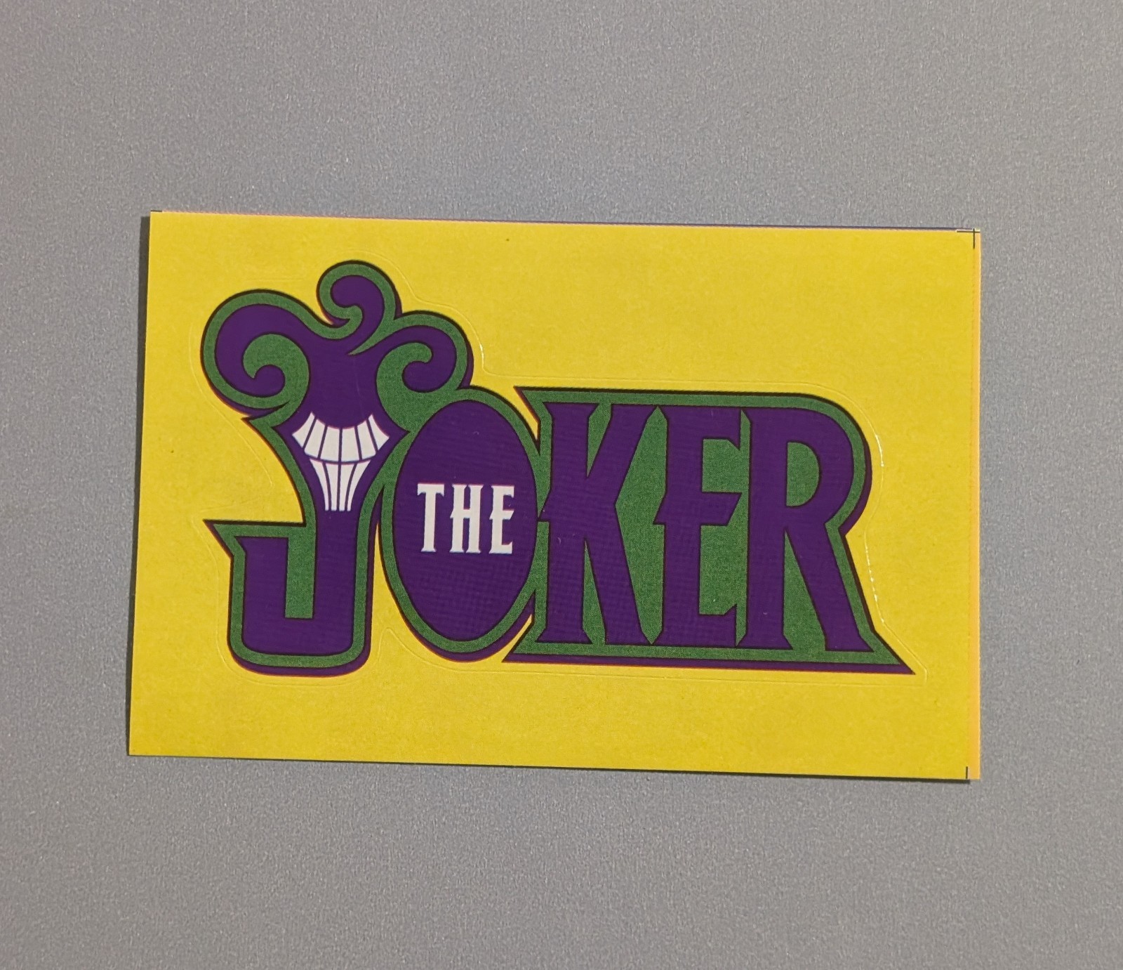 The Joker Logo Vending Sticker - DC Series 3 - Comic Villain Smiling Jester