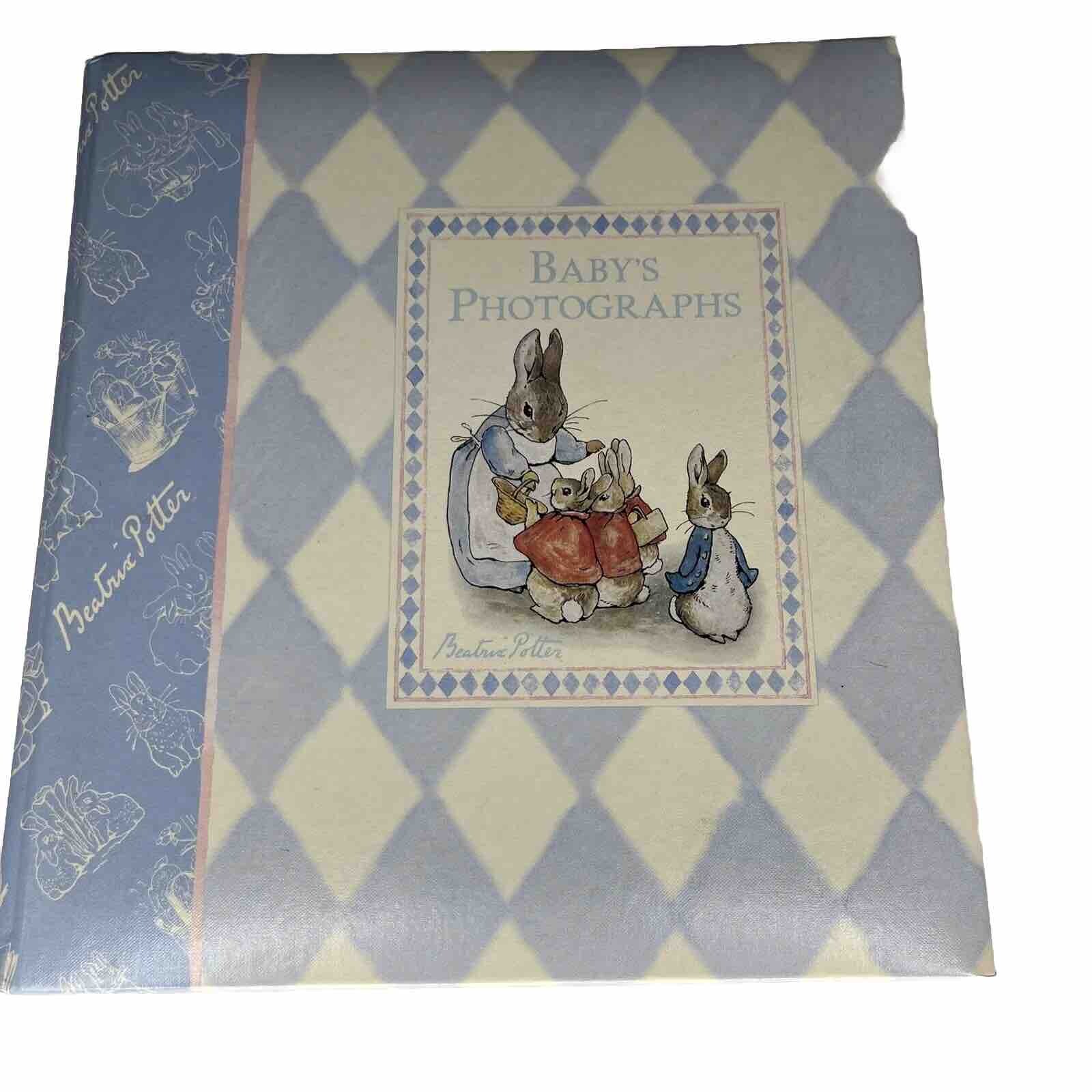 the Beatrix Potter collection  1998 baby's photo album blue warne 10” 18 Pages..