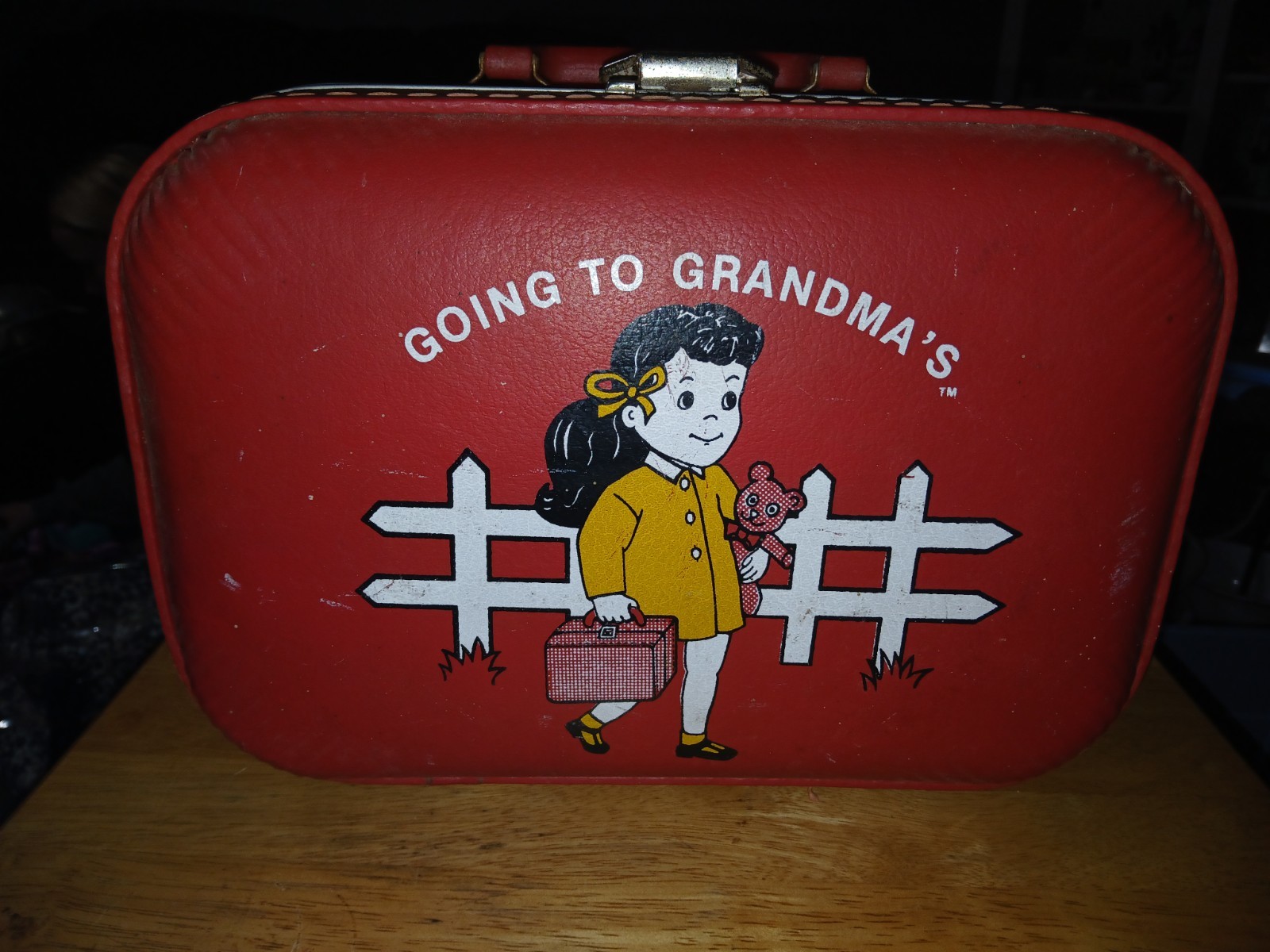 Vintage Red Suitcase That Says "Going To Grandmas"