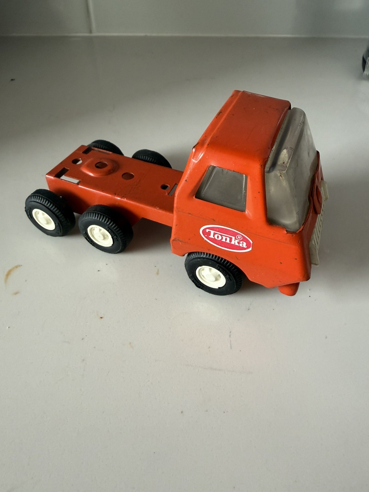 Vintage 1970s Tonka Collectible Lowboy Semi Hauler Orange Truck Toy 4.5”