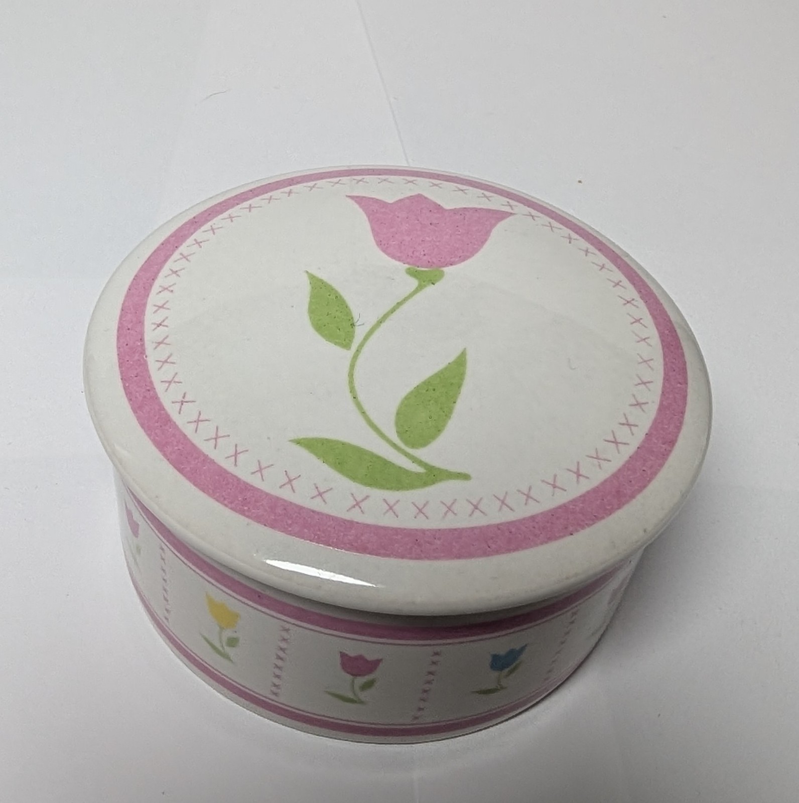 FTDA Pink Tulip Floral Ceramic Jar Round 1987 with partially burned candle