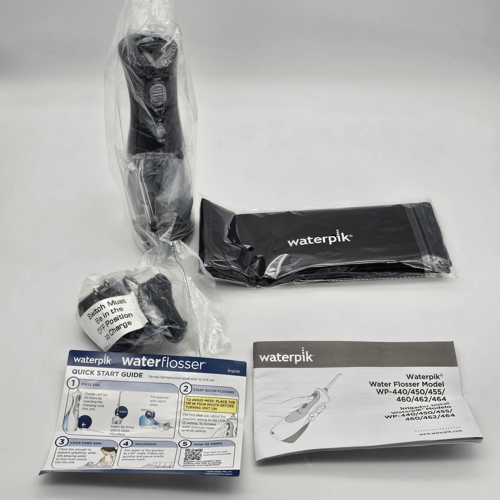 Waterpik WP-462 Portable Cordless Water Flosser w/ 4 Tips, Charger, Travel Case