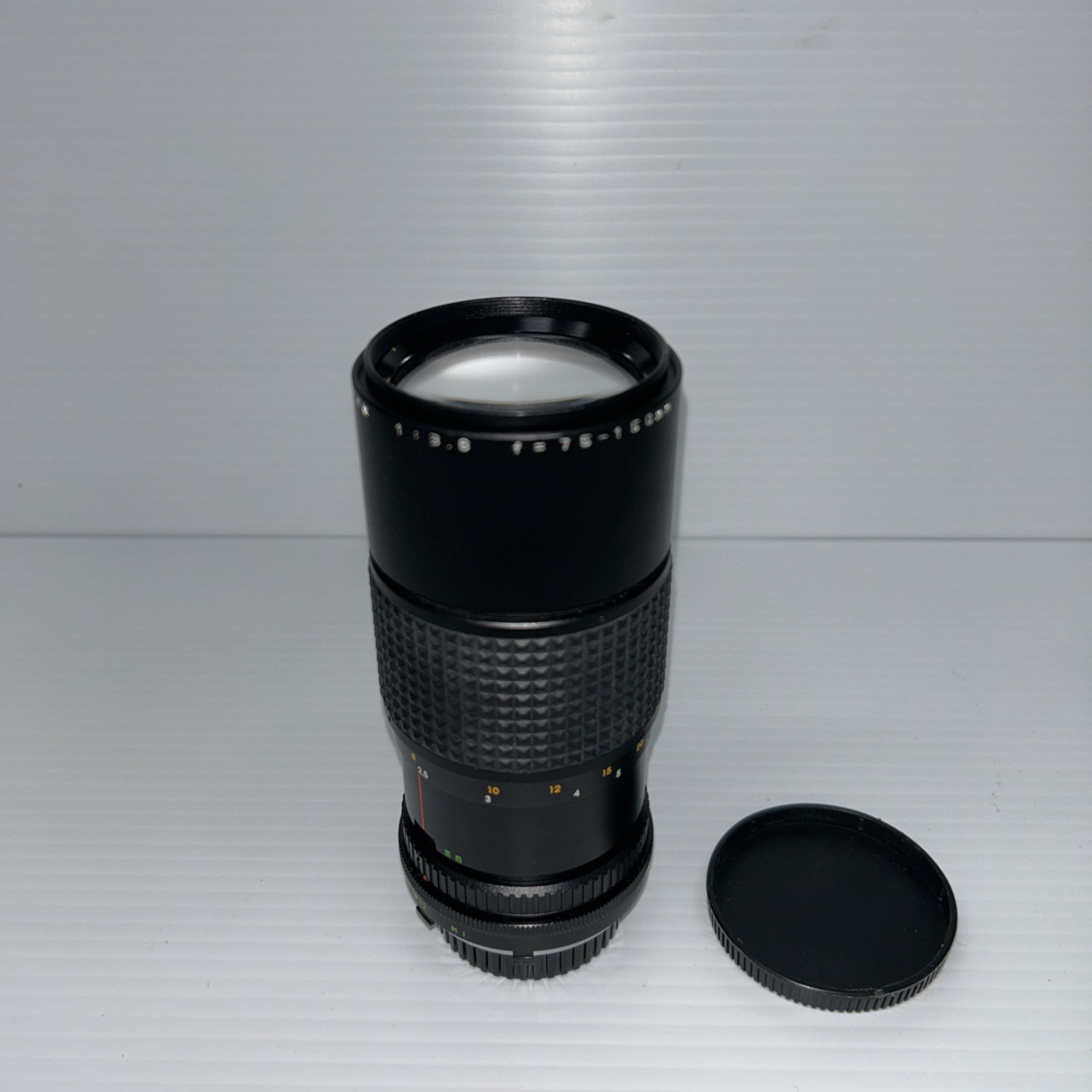 Minolta MD Makinon Zoom 75-150mm f/3.8 camera lens