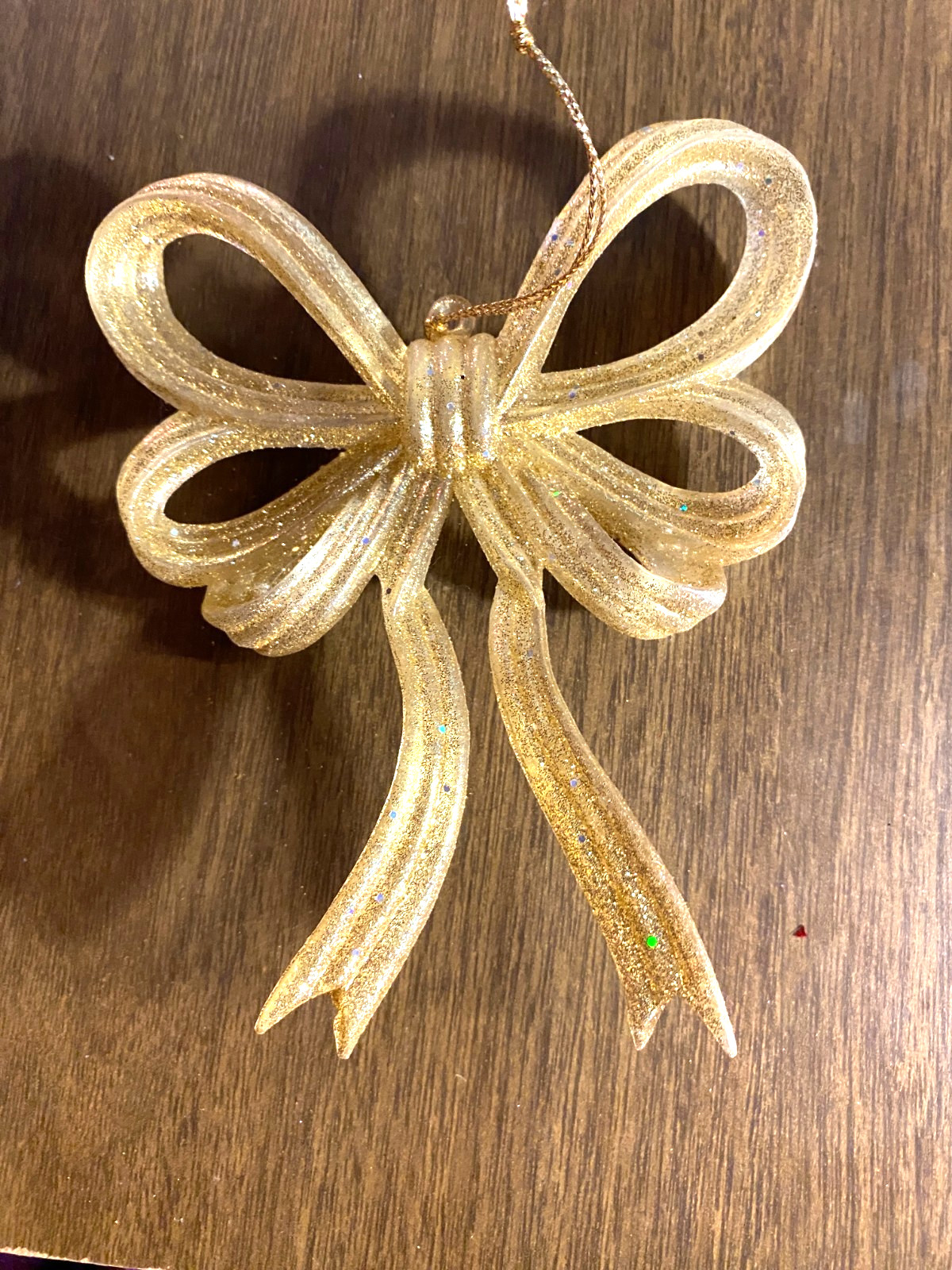 Gold Glitter Covered Plastic Bow Christmas Ornament 5.5"