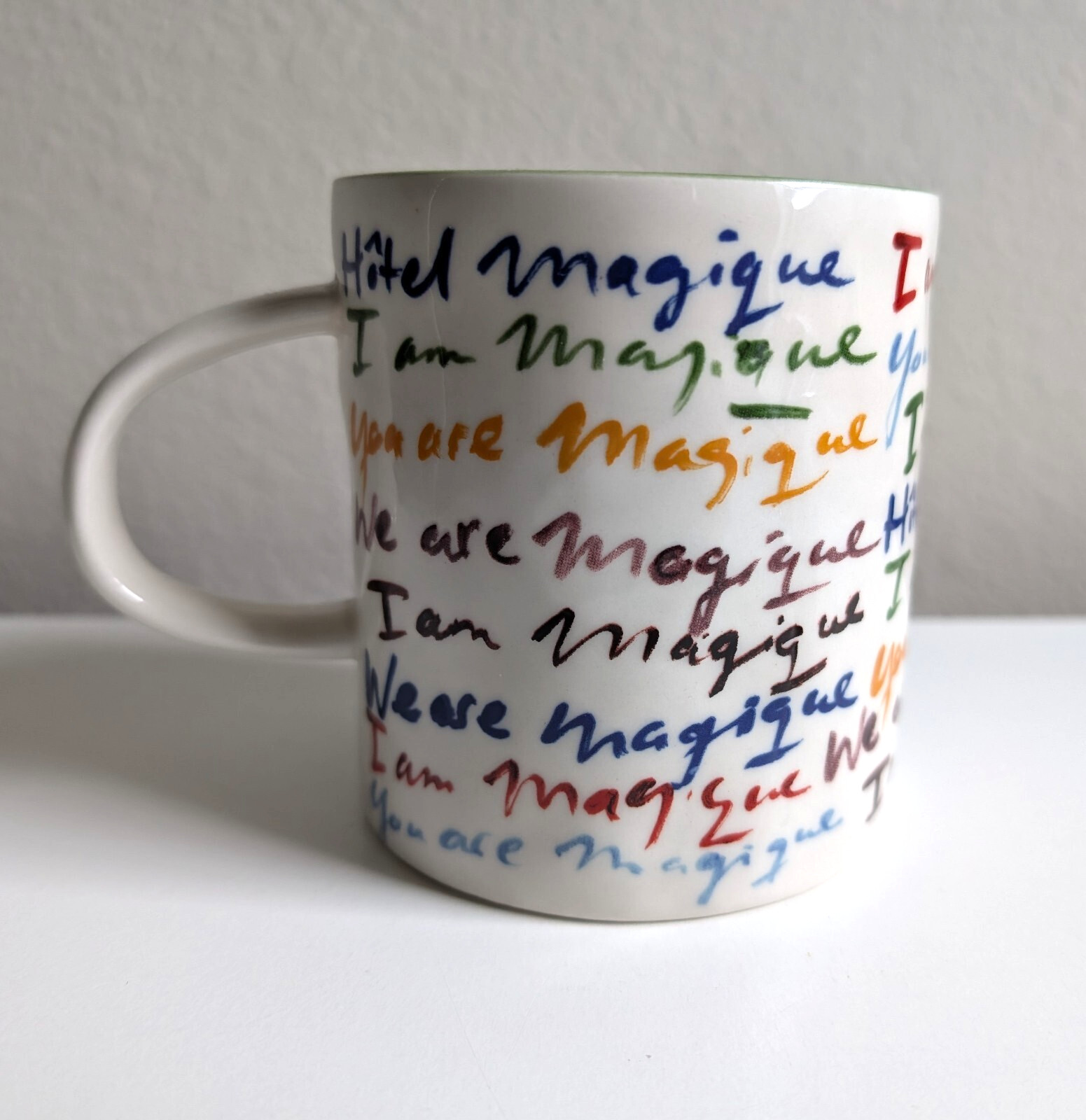 Anthropologie mug Hotel Magique colorful handwriting I am coffee cup pride
