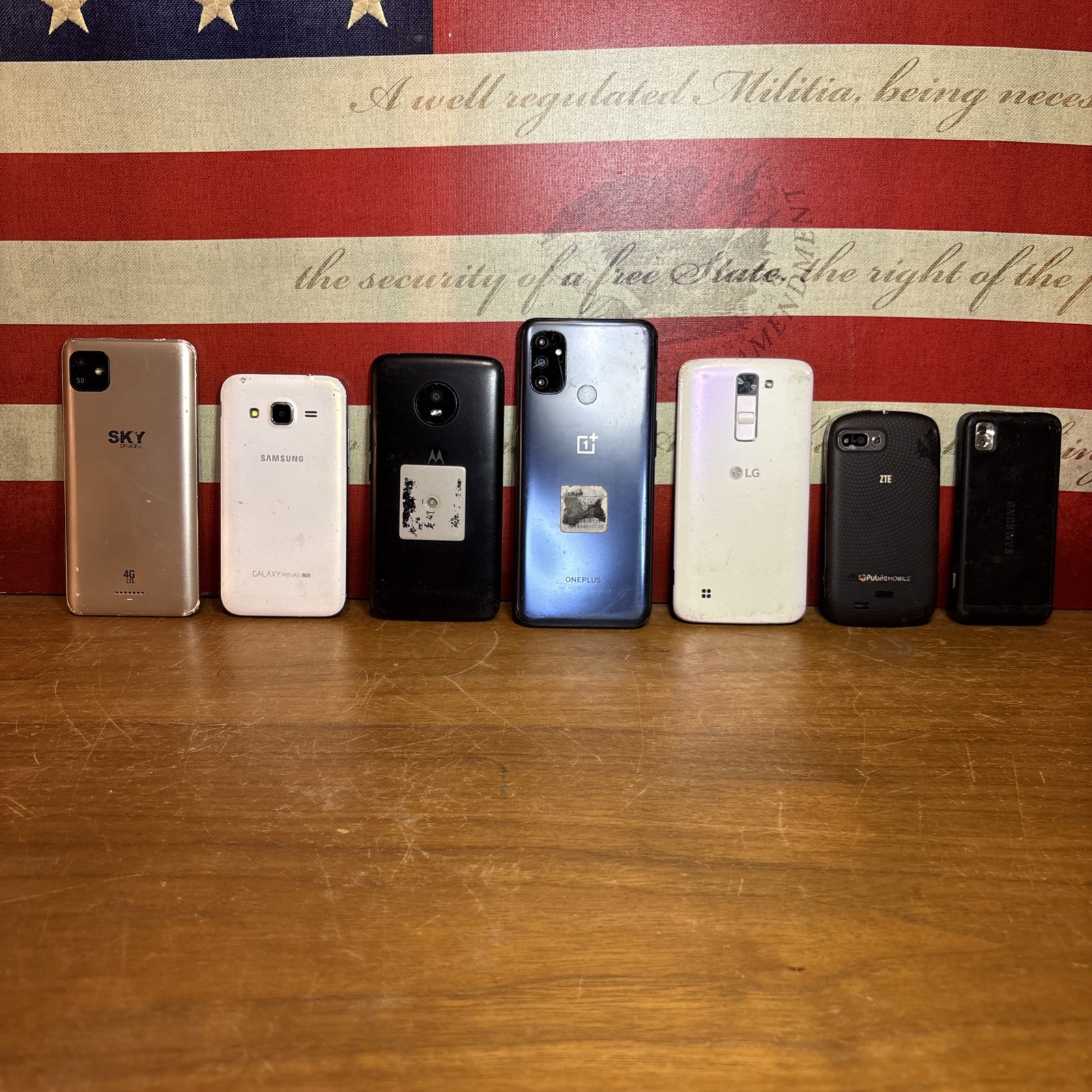 Lot of 7 different brand cell phones for spare parts only