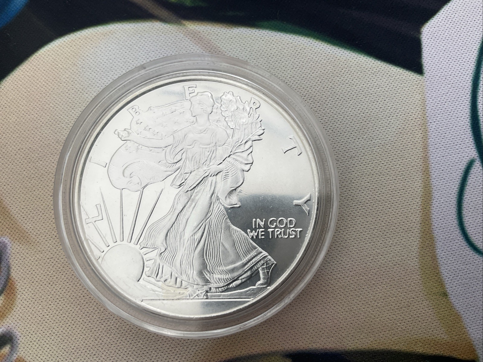 1 oz .999 Fine Silver WALKING LIBERTY ROUND. BU in CAPSULE