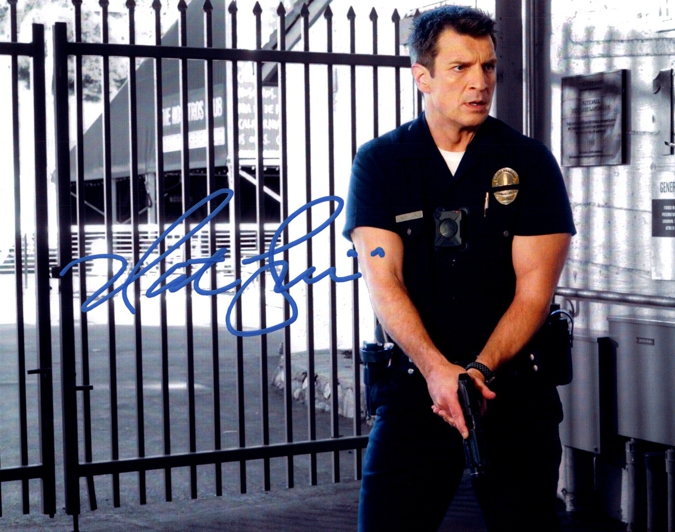 Nathan Fillion Police Serious Pose Signed Autographed Photo Authentic 8X10 COA