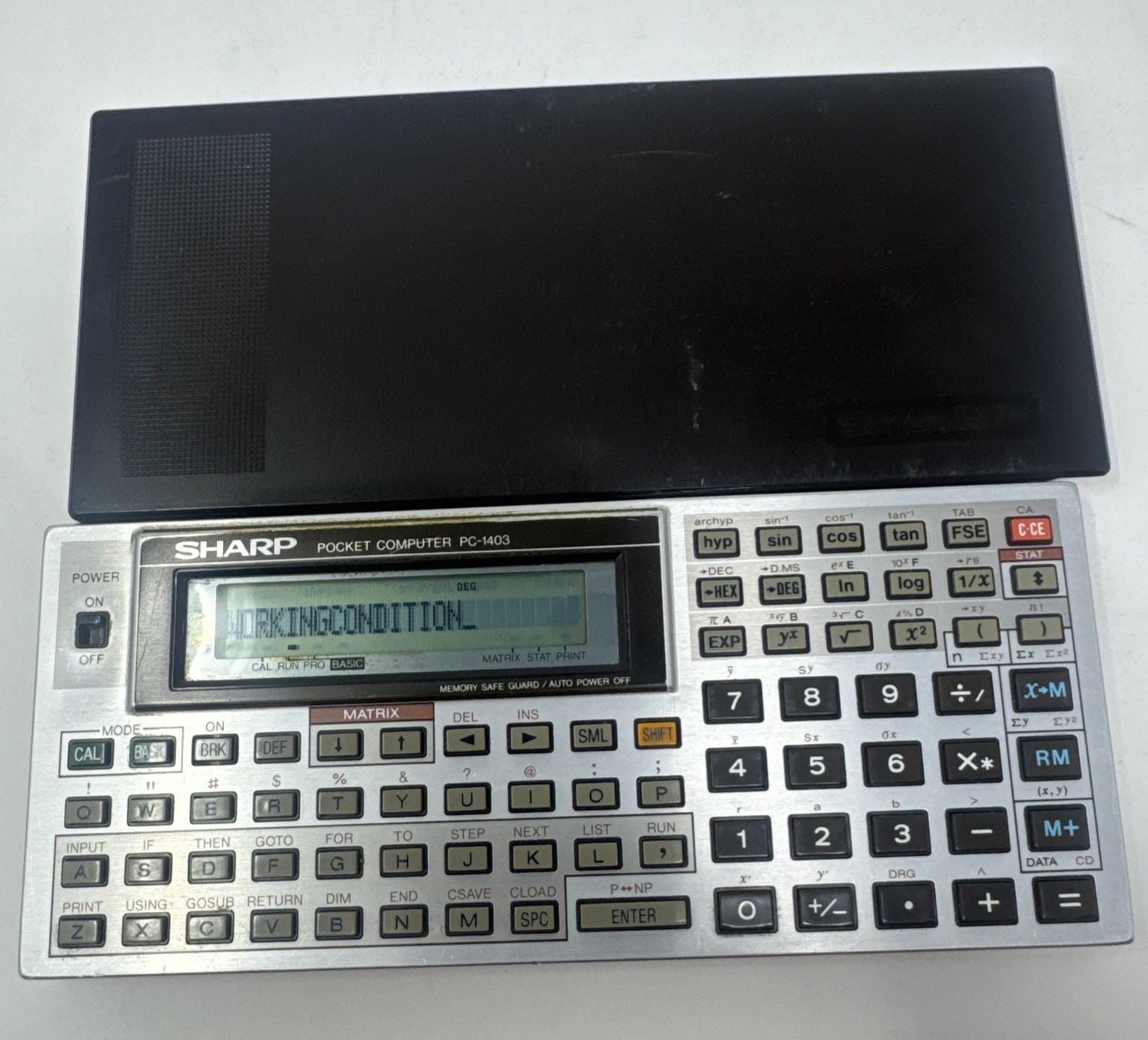 SHARP PC-1403H pocket computer  32 KB  very good condition- Works