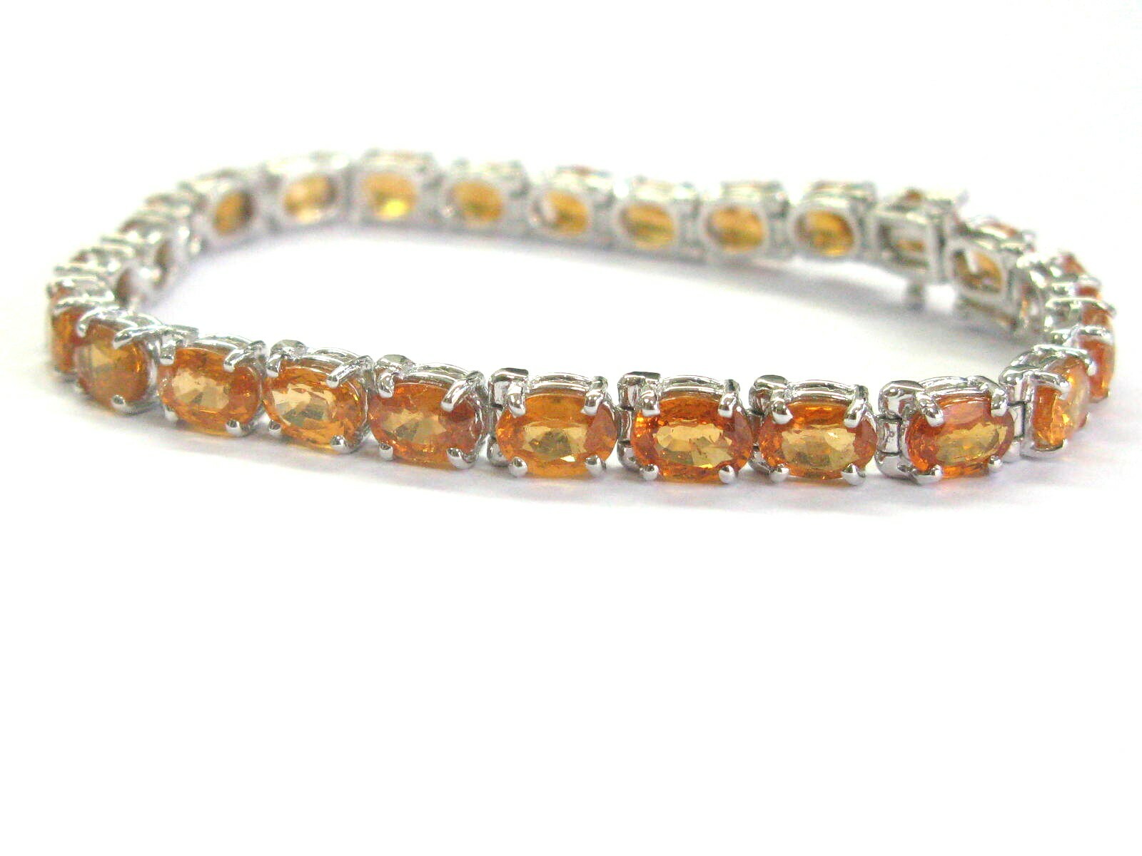 Orange Sapphire Oval Shape Tennis Bracelet 18Kt White Gold 17.50Ct 7.5"