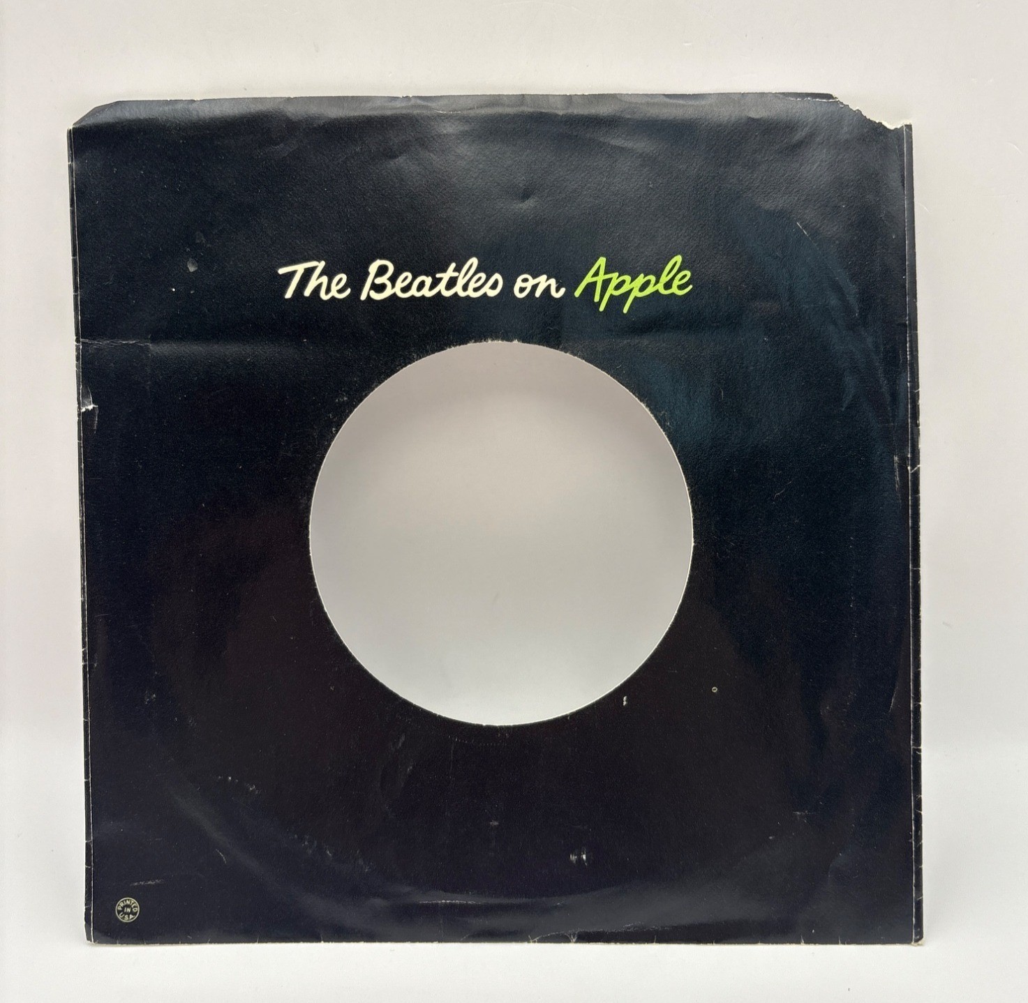 The Beatles on Apple Records Company Sleeve 45 RPM Vinyl Black Green Logo Glossy