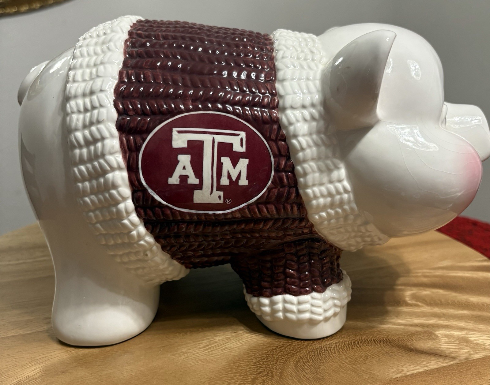 Retired "Sweater" version of the Texas A&M piggy bank by The Memory Company