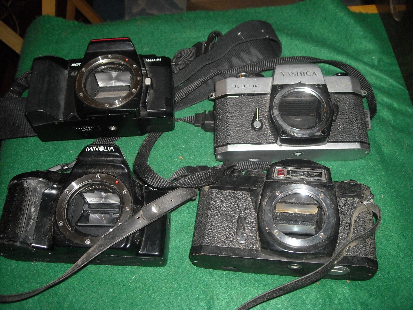 4 assorted 35mm cameras for parts or repair untested