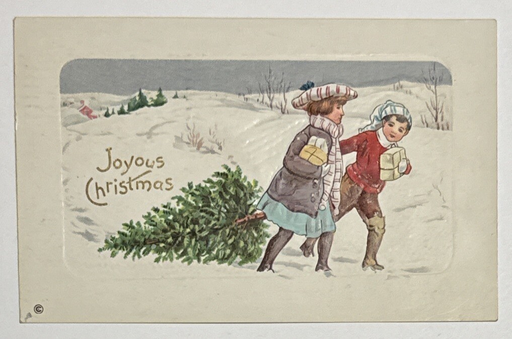 Joyous Christmas Children Dragging Tree Through Snow Present Antique Postcard