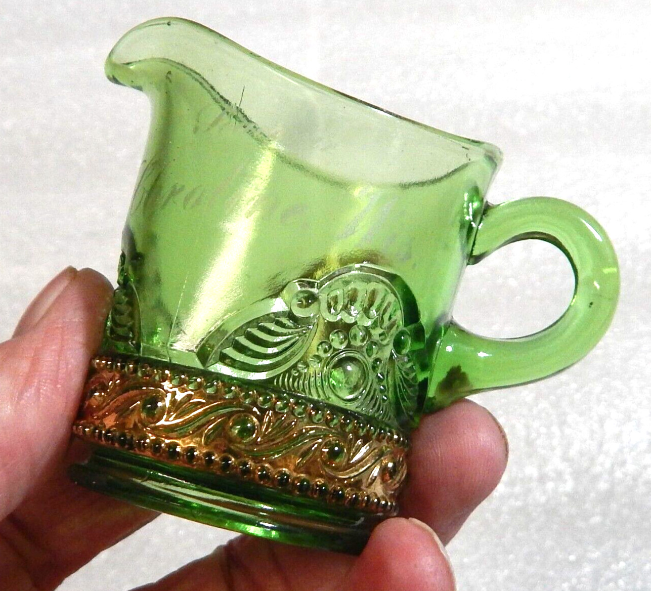 Antique Souvenir EAPG Green Glass Creamer Caroline, Wisconsin Gold Trim Eye