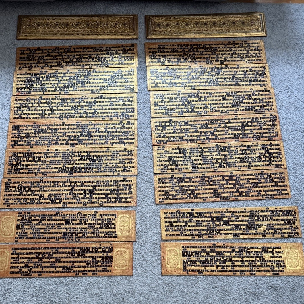 Antique Handwritten Manuscript with Ornate Borders, Traditional Script on Paper