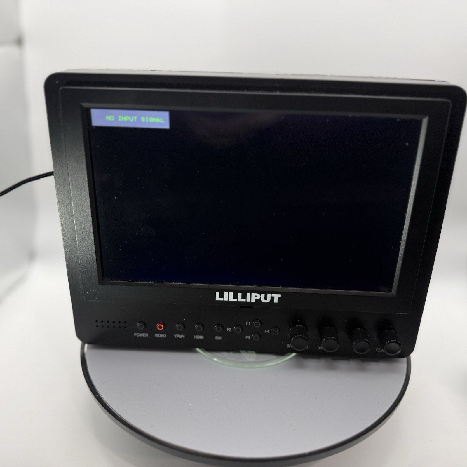 Lilliput 665 7” SDI HDMI Field Monitor – Powers On – Hood + Adapter