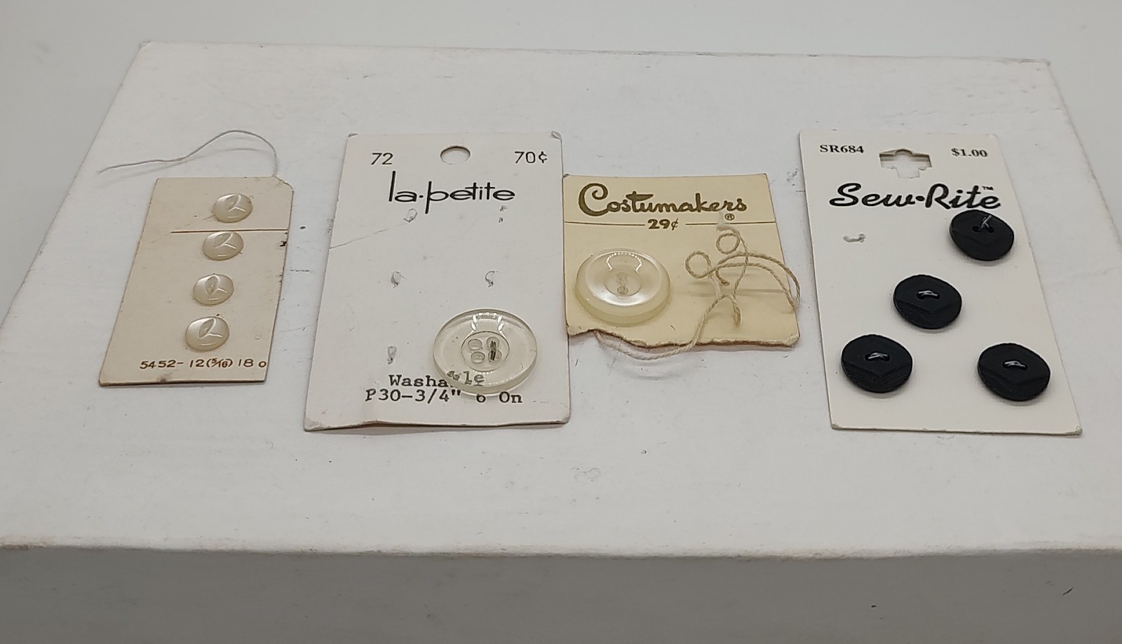 vintage Mix lot of Cards of Sew-through buttons. Different Sizes, And Brands. 