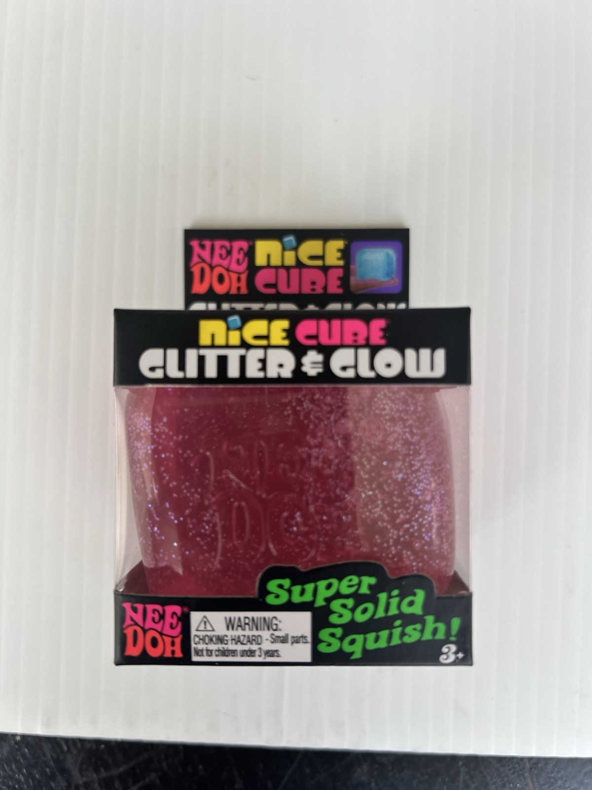 NeeDoh Nice Cube Glitter & Glow Pink Super Solid Squish! 3+
