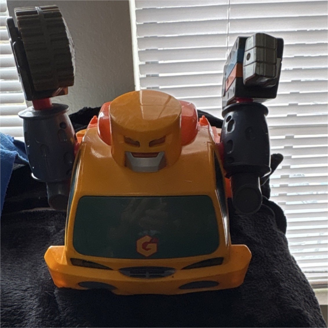 Yellow Orange Transforming Robot Vehicle Toy with Wheels & Movable Arms