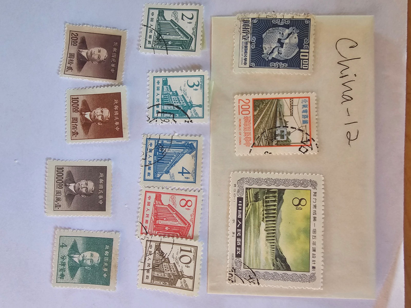 China stamps, lot of 12 stamps, used in fair condition