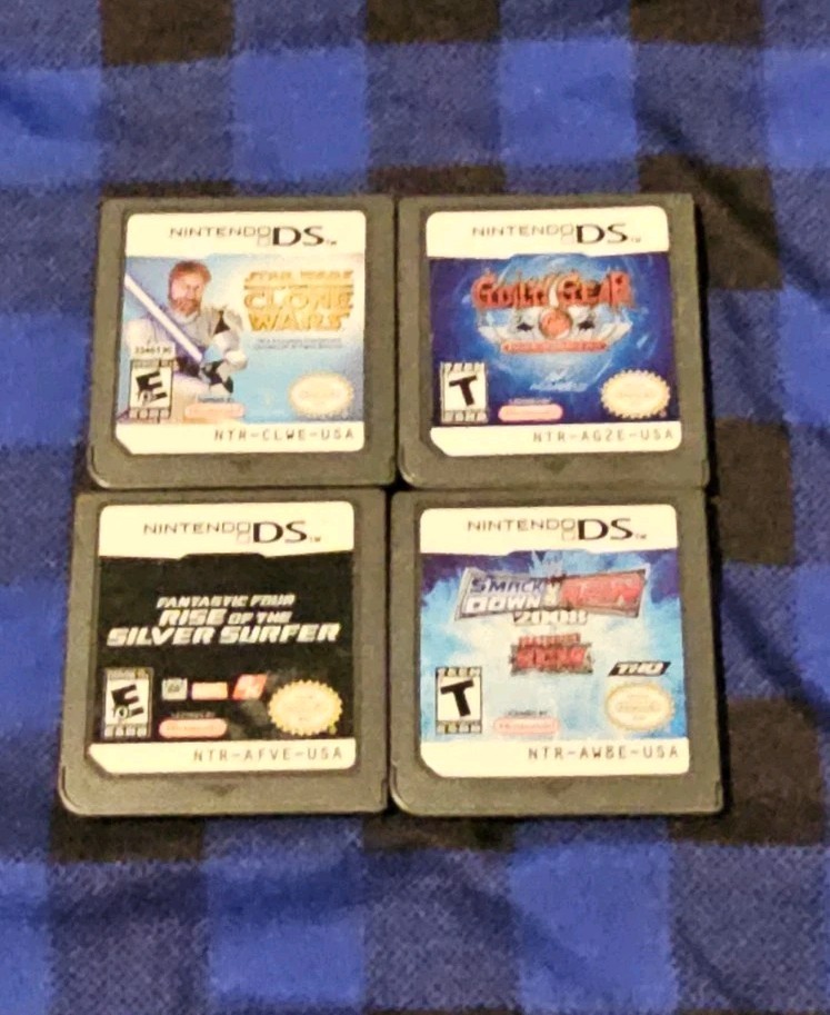 Lot of 4 Nintendo DS Games Star Wars Clone Wars WWE Fantastic Four Guilty Gear