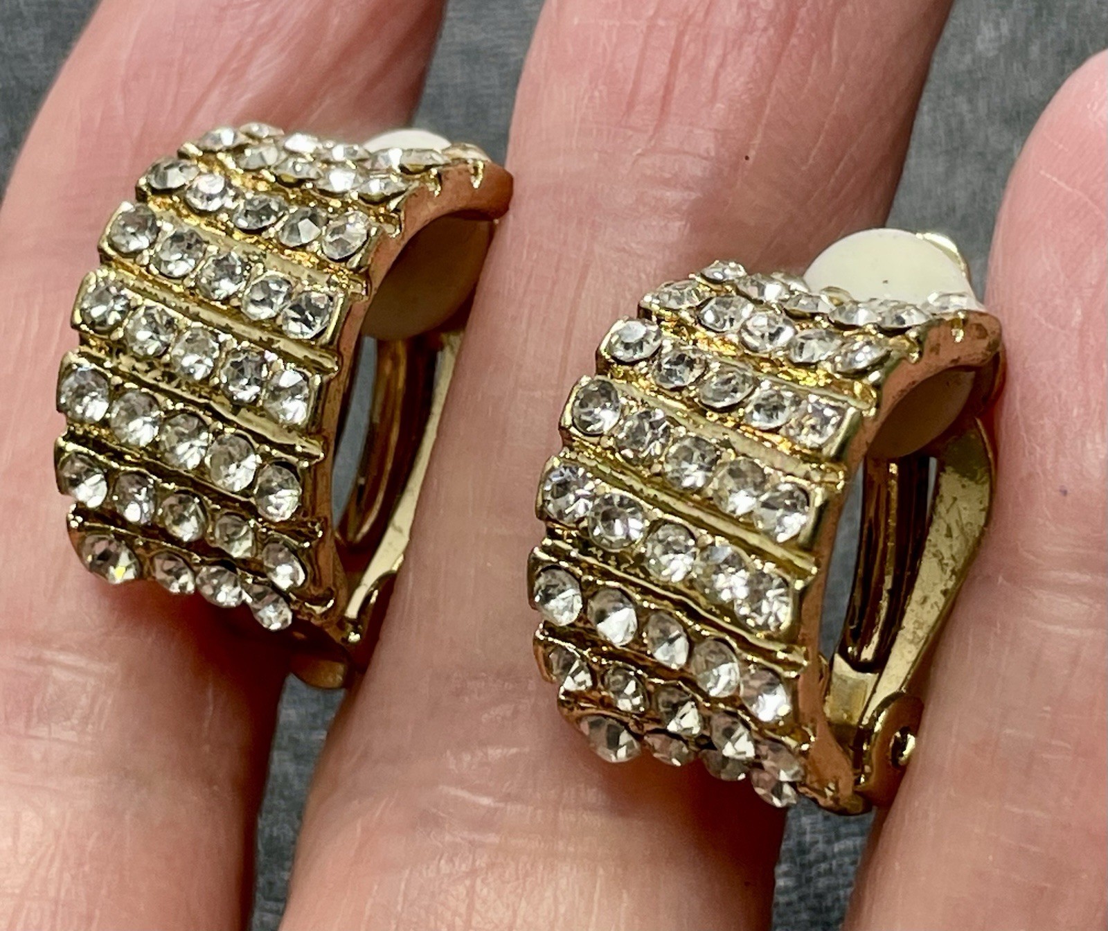 Vintage 3/4” Curled Crystal Rhinestone Gold Tone Clip Earrings