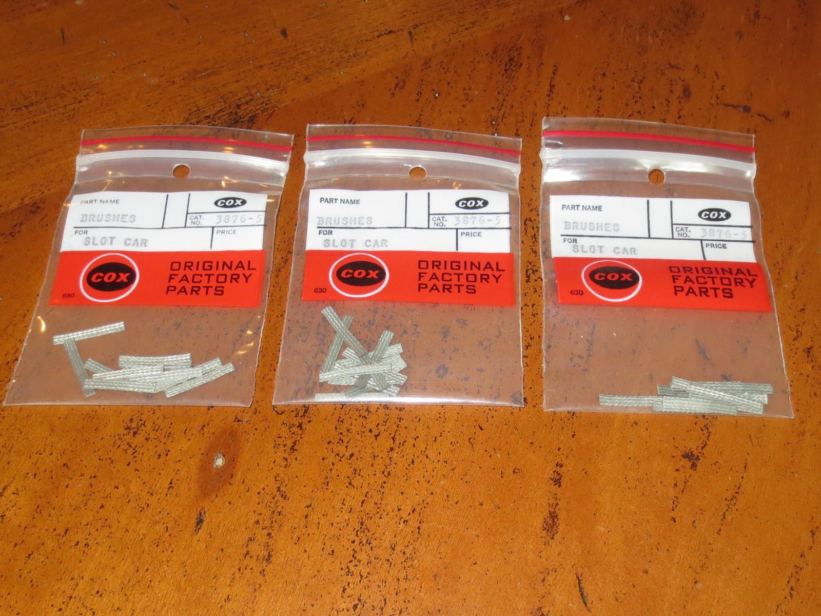 3 PACKAGES EARLY VINTAGE COX #3876-5 SLOT CAR BRUSHES - 12 COUNT - MIP