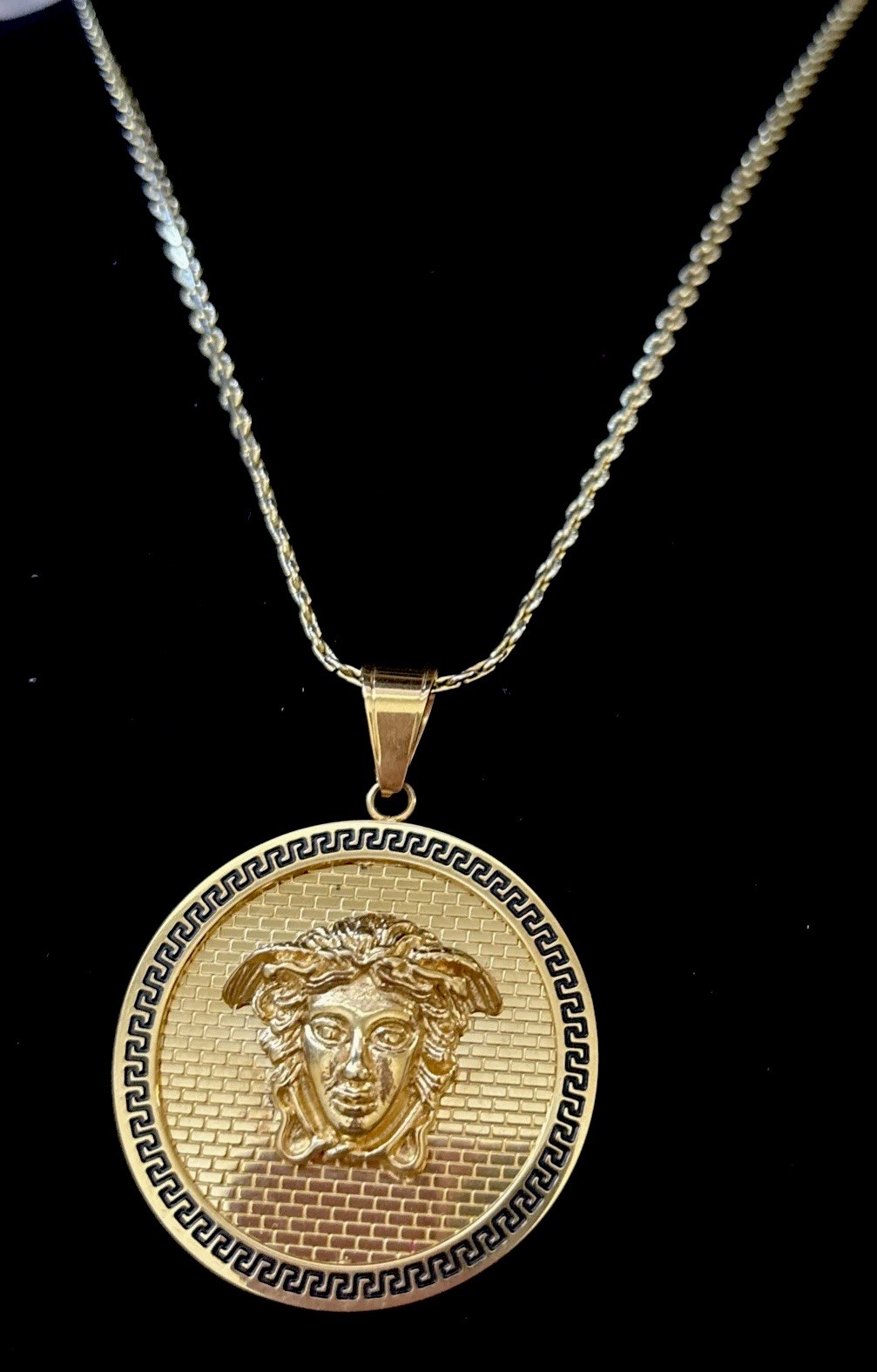 Versace-style Medusa pendant necklace with a gold-tone chain