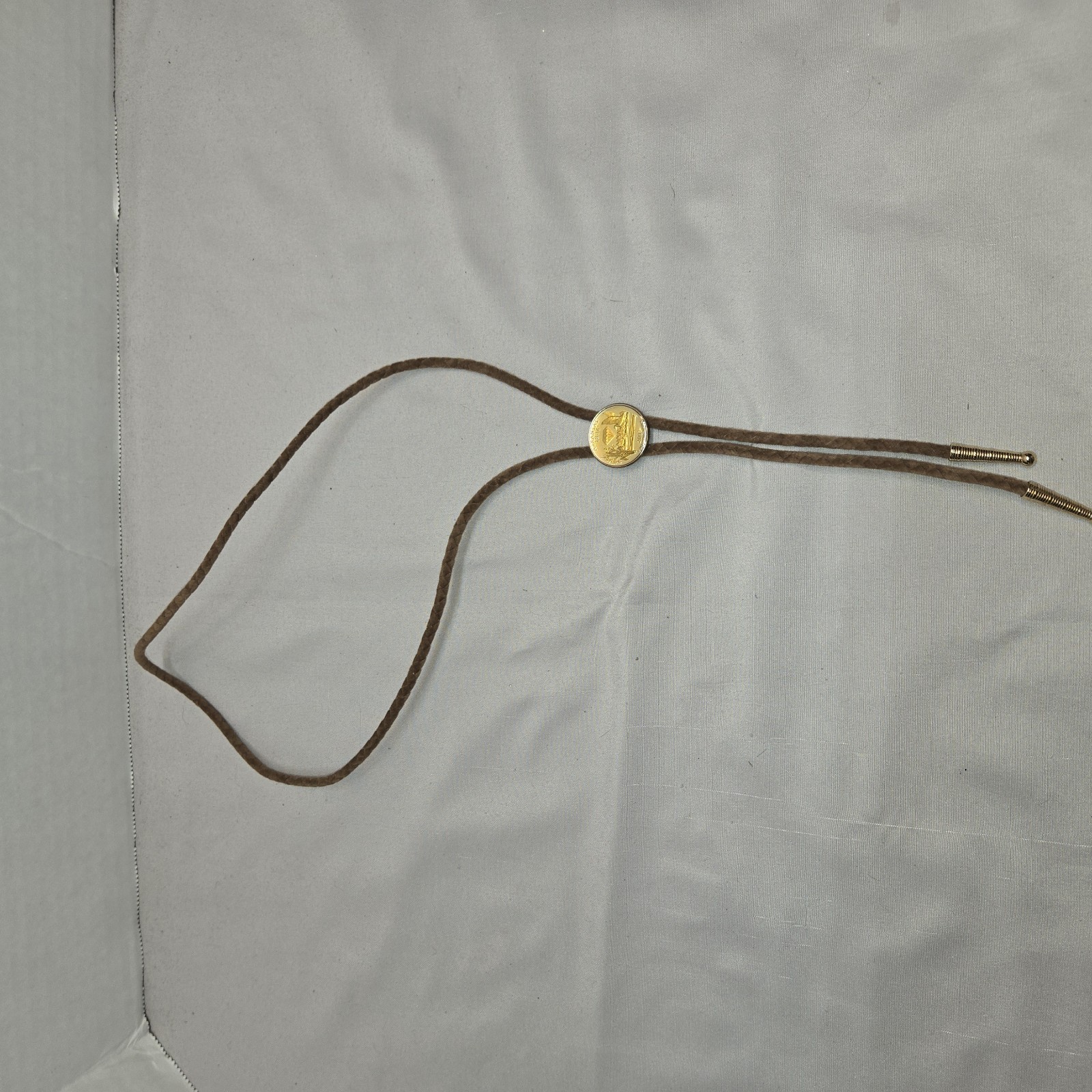 Bolo Tie, Western Cowboy Arkansas Quarter Gold Tone Slide 