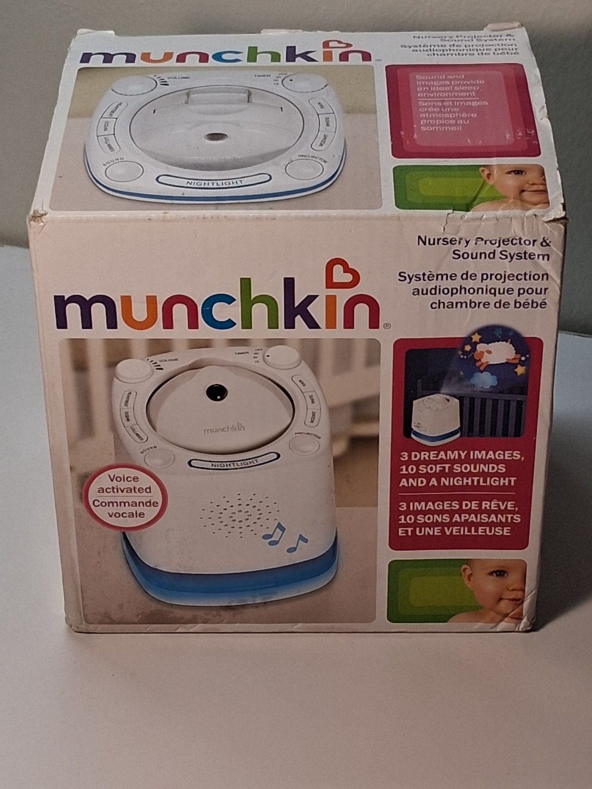 munchkin nursery projector and sound system new open box