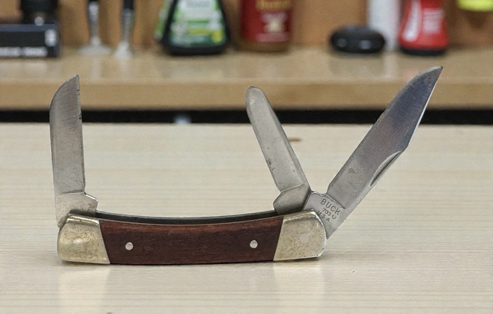 Vintage 1998 Buck 703 Brown Wood Handle Folding 3 Blade Pocket Knife Made in USA