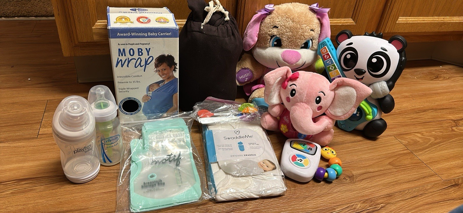 Moby Wrap, SwaddleMe Swaddle, Playtex & Dr. Brown's Bottles, Plush Toys Lot