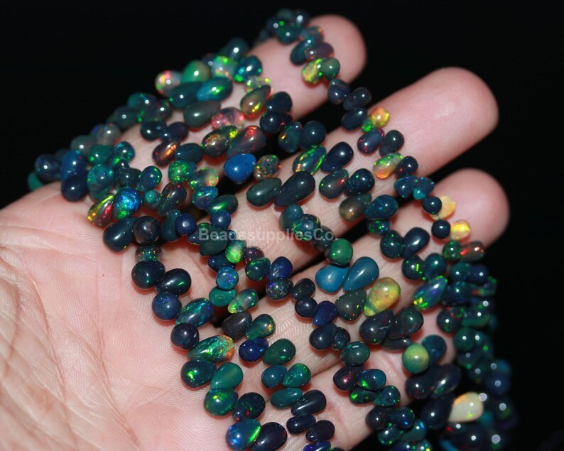 AAA+ Black Ethiopian Opal Teardrop Beads: Multi Fire Smooth Opal (8'' Strand)