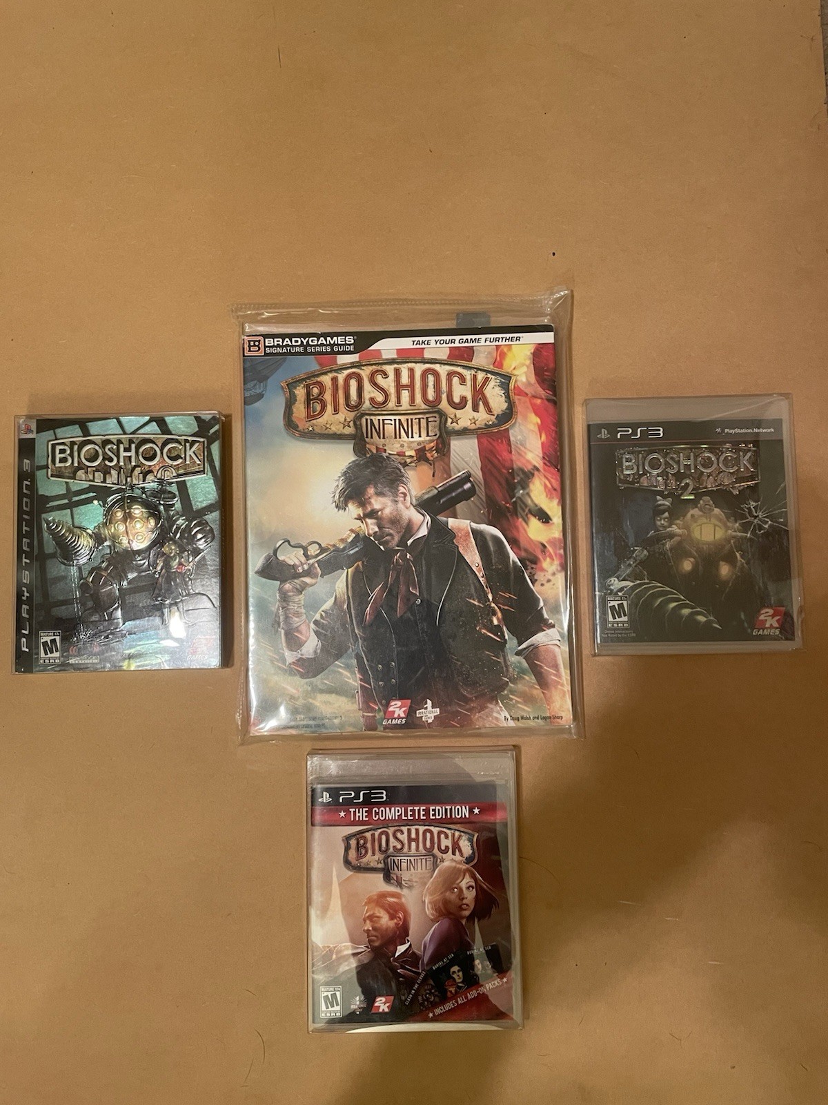 BioShock Lot of 3 Games & 1 Guide-I, II & Infinite + Infinite Strategy Guide  
