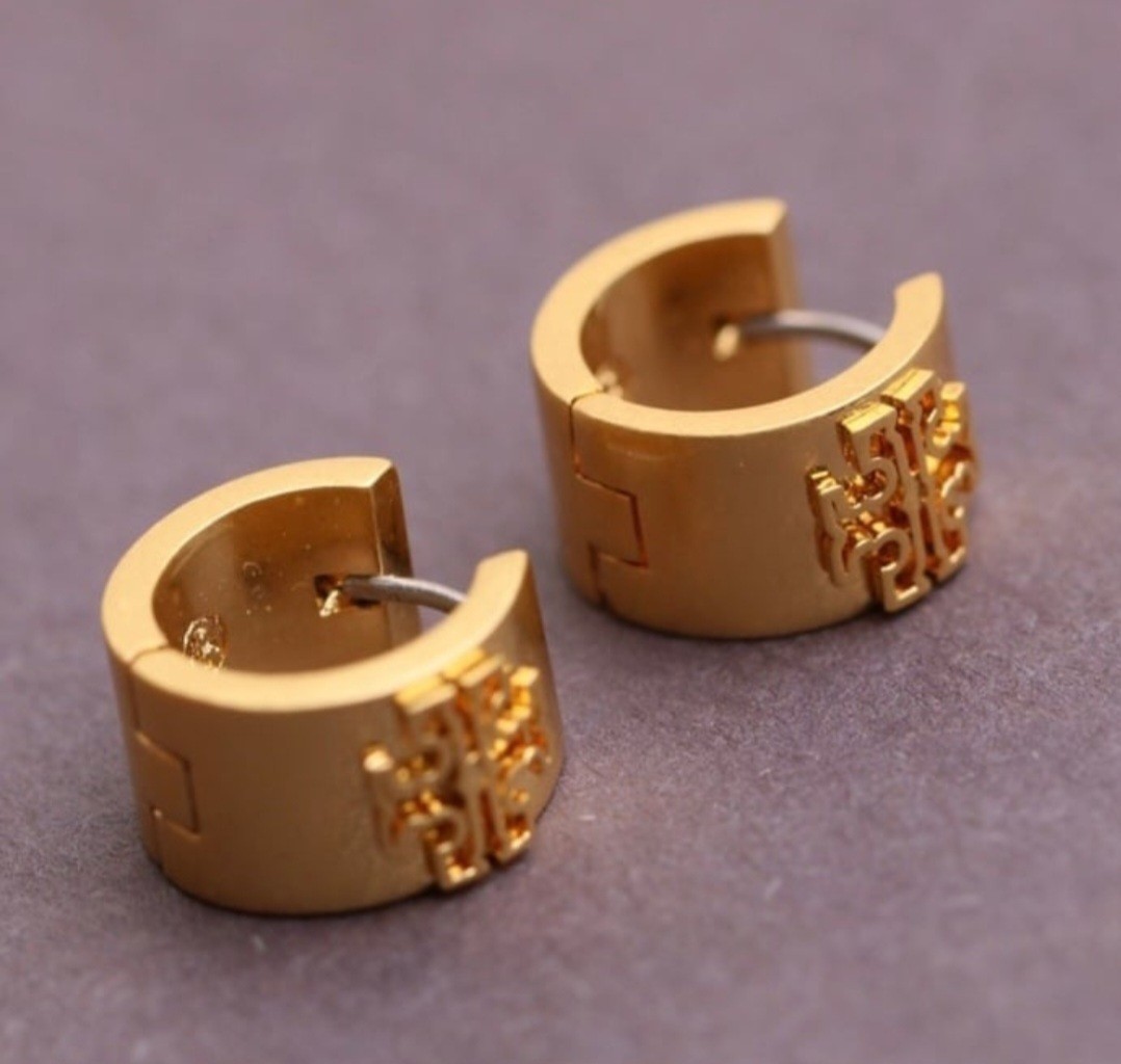 Tory Burch Gold Tone Huggie Earrings Decorative Design Hinged Closure Round Lobe